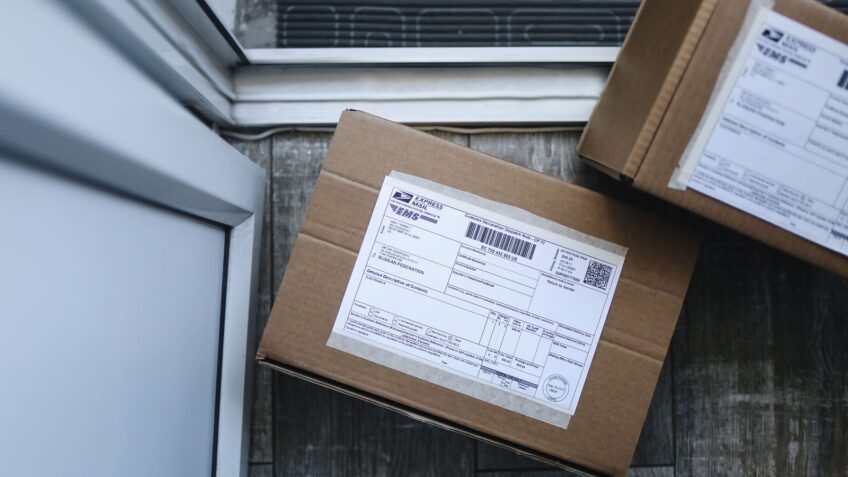 Package delivery box on a doorstep after an online purchase
